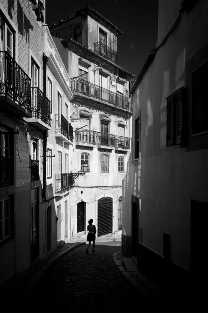 A narrow street, one figure